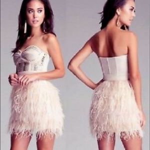 bebe IsIs studded embellished feather strapless dress